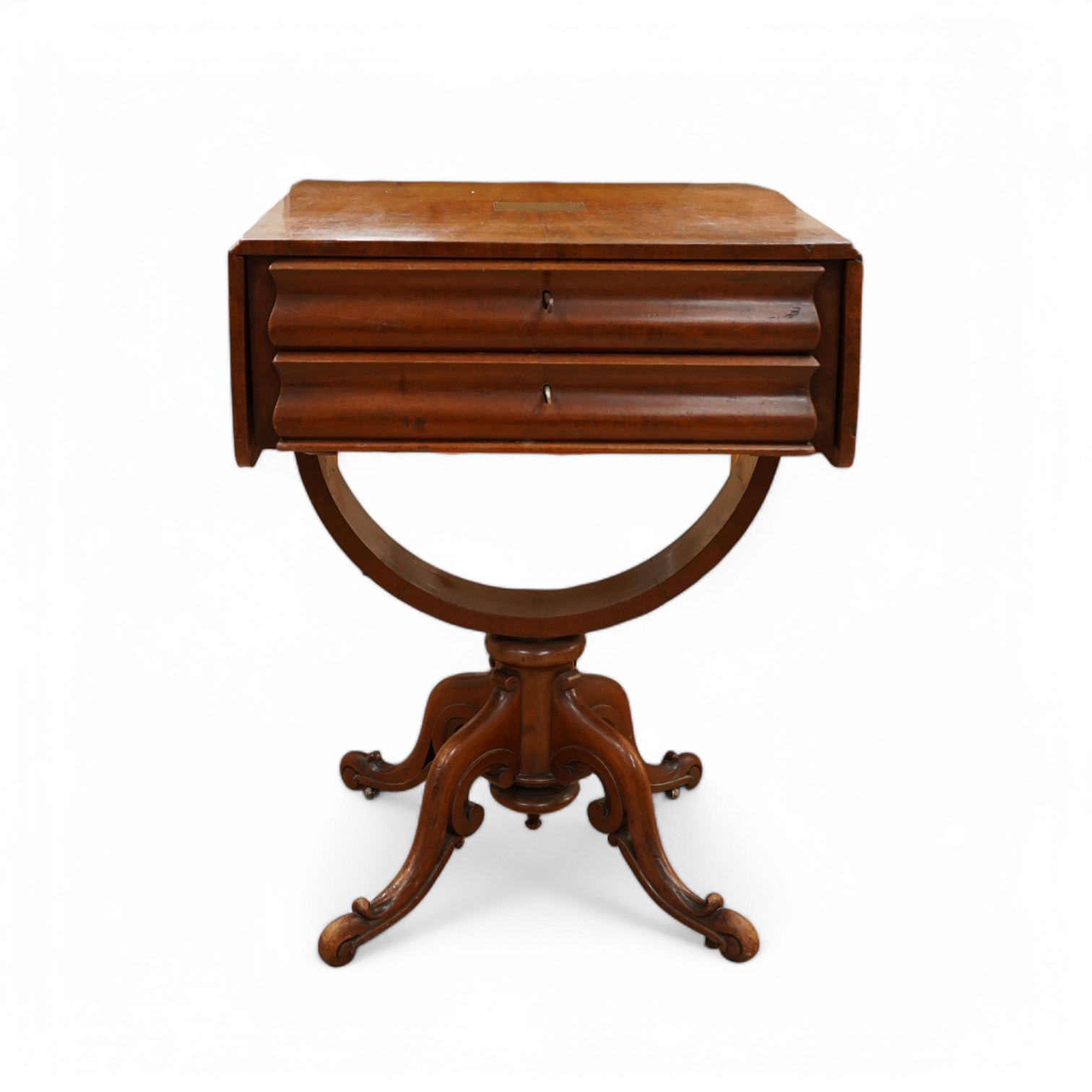 A mid 19th century mahogany pedestal Pembroke table, with inset brass plaque engraved; ‘Presented to Qtr. Master Sgt. Ed. Rainey by his Comrades the Officers, Non-Commissioned Officers and Privates of the 7th Company Lin